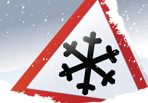 Road sign warning of the dangers of winter